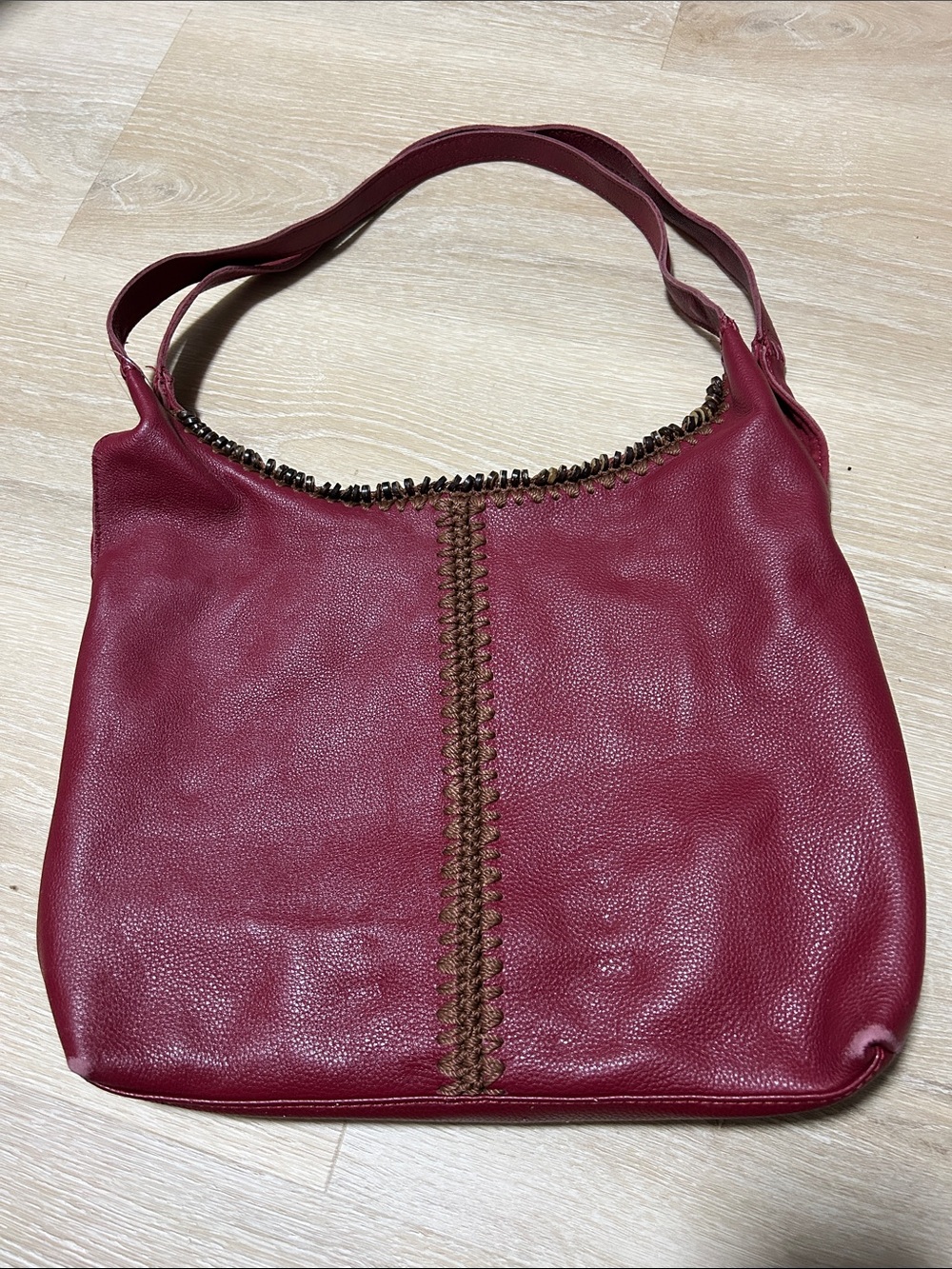 The Sak Deep Wine Leather Shoulder Bag with Whipstitch Detail